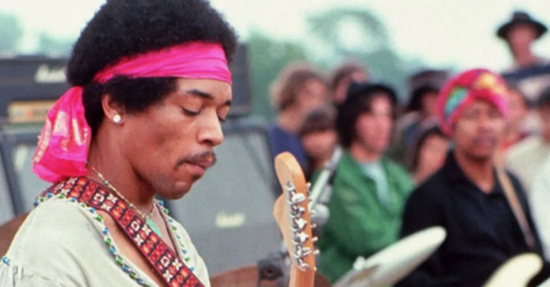 Jimi Hendrix plays